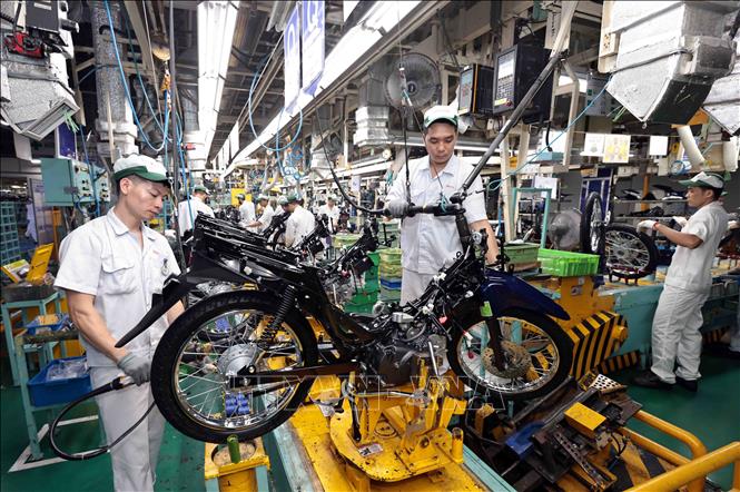 Dây chuyền sản xuất  xe gắn máy tại nhà máy Honda Phúc Yên, Vĩnh Phúc. Ảnh: Trần Việt - TTXVN