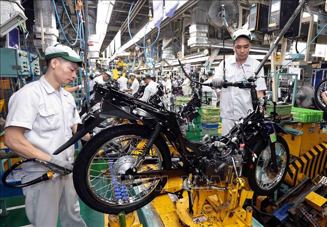 Dây chuyền sản xuất  xe gắn máy tại nhà máy Honda Phúc Yên, Vĩnh Phúc. Ảnh: Trần Việt - TTXVN
