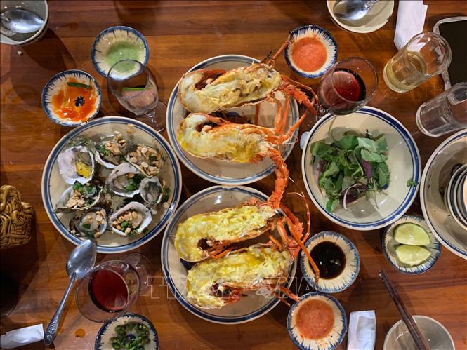 Delicious seafood made by local fishermen in Vinh Hy village. VNA Photo: Nguyễn Thành