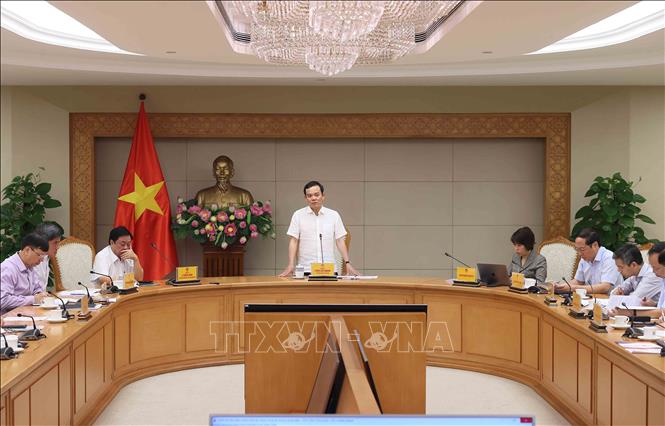 Phó Thủ tướng Trần Lưu Quang chủ trì họp triển khai Đề án 1 triệu ha lúa chuyên canh vùng Đồng bằng sông Cửu Long. Ảnh: An Đăng - TTXVN