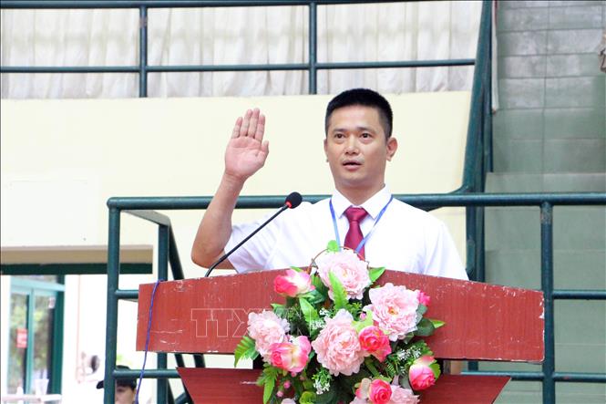 Đại diện lực lượng trọng tài tuyên thệ tại lễ khai mạc. Ảnh: Trung Kiên - TTXVN