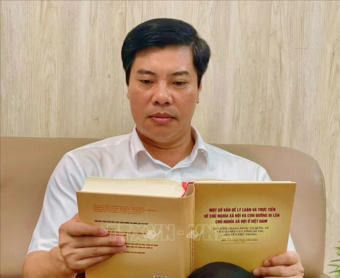 Ủy viên Ban Thường vụ, Trưởng Ban Tuyên giáo Thành ủy Chí Linh (Hải Dương) Nguyễn Minh Thắng bày tỏ lòng tiếc thương vô hạn với mất mát không chỉ của Đảng, của đất nước mà còn của từng người dân Việt Nam. Ảnh: Mạnh Tú - TTXVN