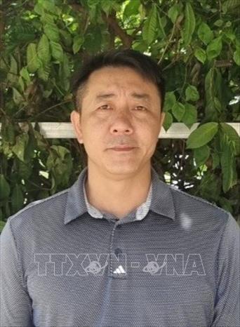 Anh Nguyễn Thế Bình, xã Kim Chung, huyện Đông Anh bày tỏ tiếc thương khi biết tin Tổng Bí thư Nguyễn Phú Trọng qua đời. Ảnh: Mạnh Khánh-TTXVN