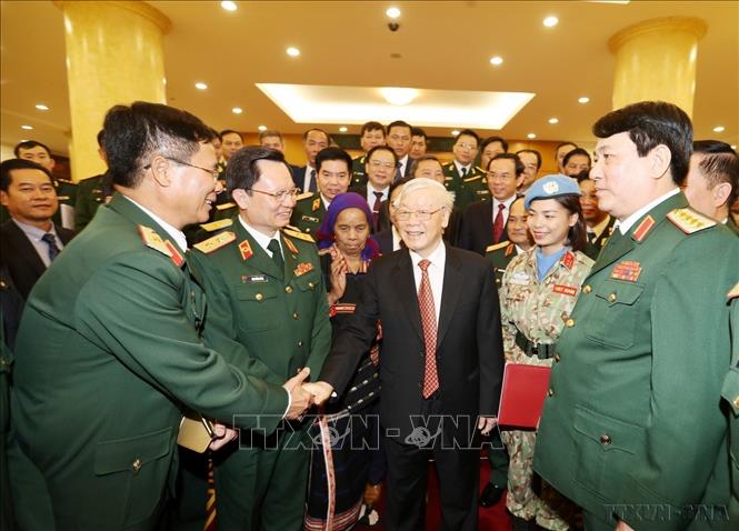 Tổng Bí thư, Chủ tịch nước Nguyễn Phú Trọng gặp mặt thân mật Đoàn đại biểu điển hình tiên tiến toàn quốc trong xây dựng nền Quốc phòng toàn dân vững mạnh (Hà Nội, 19/12/2019). Ảnh: Trí Dũng – TTXVN