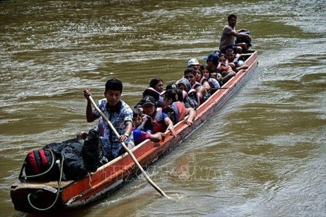 Người di cư tới trung tâm tiếp nhận người tị nạn ở Lajas Blancas, Darien, Panama, ngày 28/6/2024. Ảnh: Getty Images/TTXVN