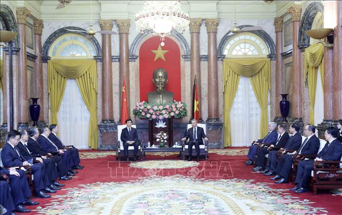 President To Lam receives Wang Huning, chairman of the National Committee of the Chinese People's Political Consultative Conference. VNA Photo: Nhan Sáng