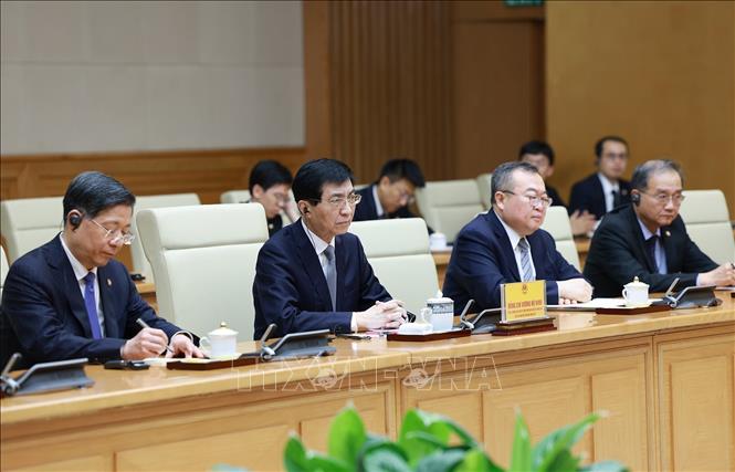 Wang Huning, chairman of the National Committee of the Chinese People's Political Consultative Conference, at the reception. VNA Photo: Dương Giang