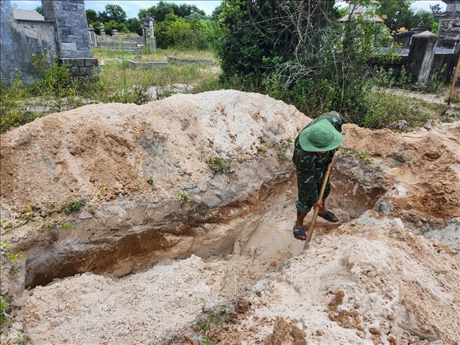 Đội quy tập 192 phải tìm kiếm nhiều năm mới có thể tìm đúng nơi các liệt sĩ bị vùi lấp trong chiến tranh năm xưa. Ảnh: Mai Trang - TTXVN