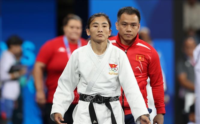 Võ sỹ judo Hoàng Thị Tình bước ra sàn đấu. Ảnh: Hoàng Linh-TTXVN
