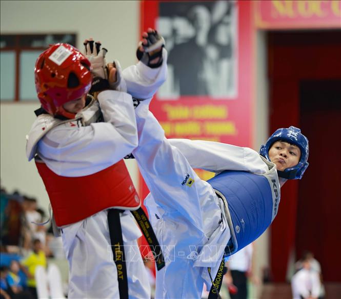 Thi đấu đối kháng môn Taekwondo, nội dung Nam, hạng -55kg. Ảnh: Thanh Tùng - TTXVN