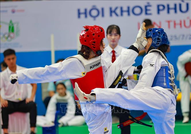 Thi đấu đối kháng môn Taekwondo, nội dung Nữ, hạng -42kg. Ảnh: Thanh Tùng - TTXVN 