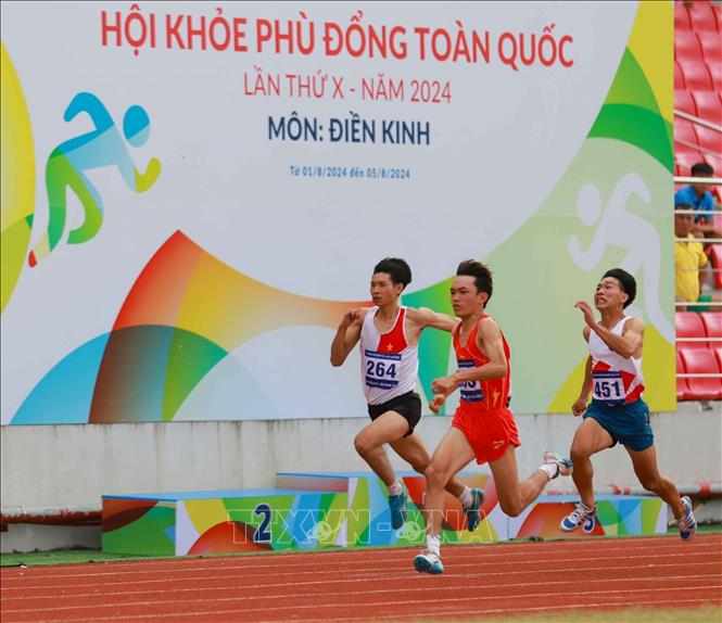 Thi đấu nội dung chạy 100m nam. Ảnh: Thanh Tùng - TTXVN