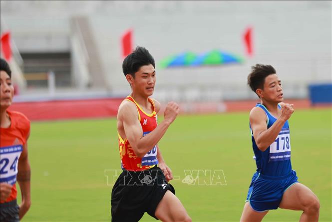 Thi đấu nội dung chạy 100m nam. Ảnh: Thanh Tùng - TTXVN