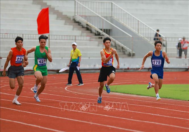 Thi đấu nội dung chạy 100m nam. Ảnh: Thanh Tùng - TTXVN