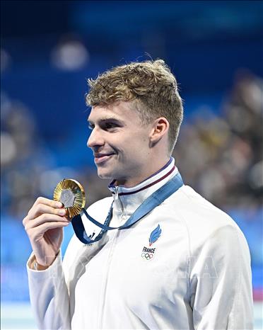 Kình ngư Leon Marchand thống trị đường đua xanh của Olympic Paris2024 khi giành 4 HCV và lập 4 kỷ lục Olympic mới. Ảnh: THX/TTXVN 