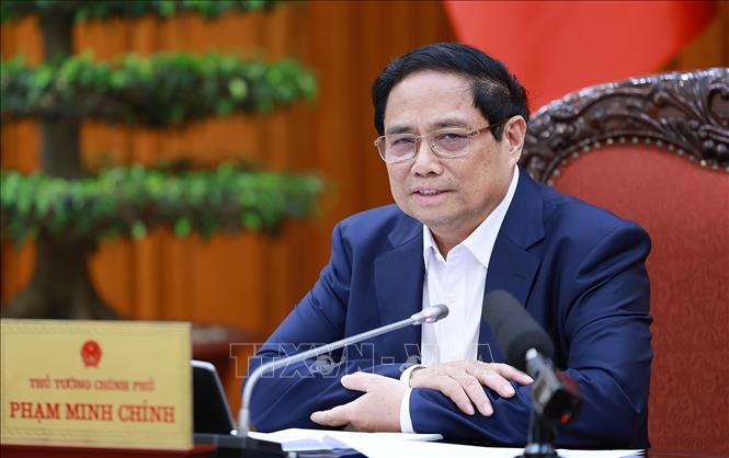 Prime Minister Pham Minh Chinh speaks at the meeting. VNA Photo: Dương Giang