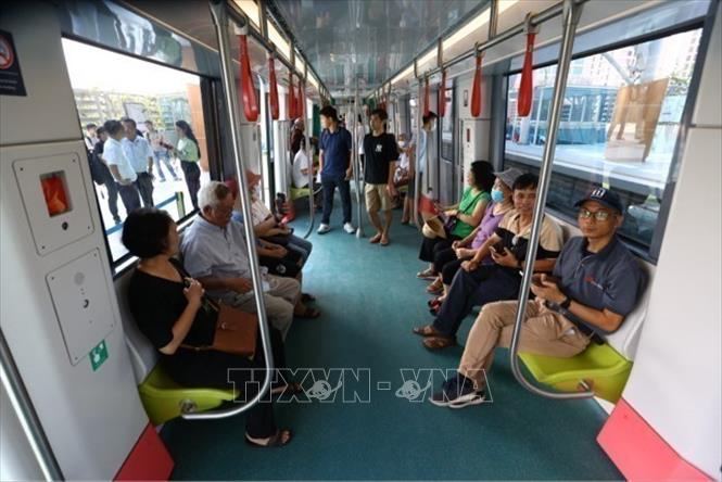 Thousands of passengers experience the route in the first day of commercial operation. VNA Photo