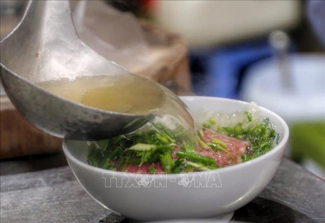 Là quê hương của nghề phở, mỗi bát phở Nam Định đã khẳng định được giá trị thương hiệu ẩm thực với nhiều nét đọc đáo. Ảnh: Tuấn Đức - TTXVN