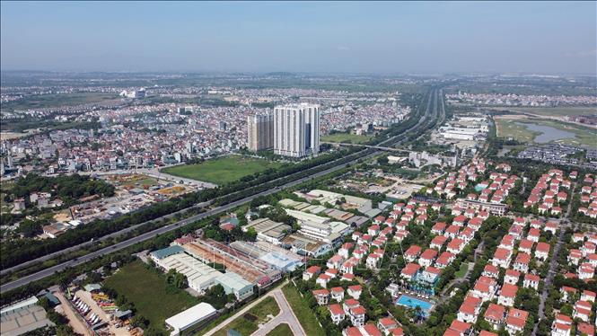 High-rise apartment buildings in Hoai Duc and Dan Phuong districts. VNA Photo: Huy Hùng
