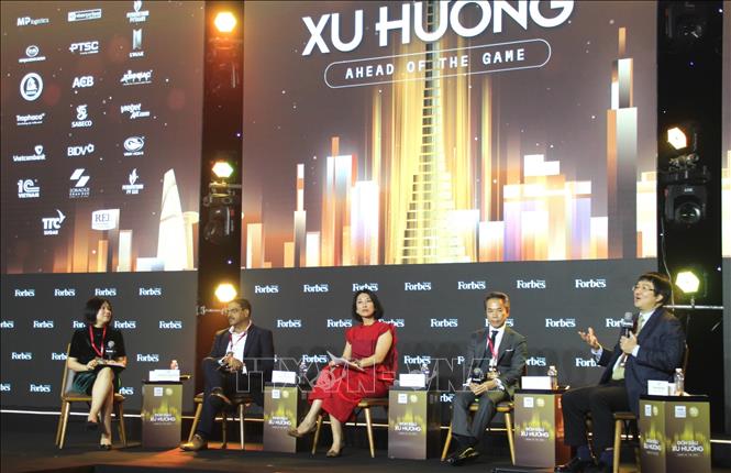 Các chuyên gia, doanh nghiệp tham gia phiên thảo luận tại sự kiện. Ảnh: Mỹ Phương – TTXVN.
