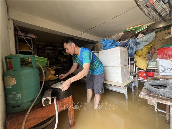 Nước tràn vào nhà anh Bế Minh Hoàng, Tổ 41, phường Hợp Giang, thành phố Cao Bằng, tỉnh Cao Bằng. Ảnh: Chu Hiệu-TTXVN.