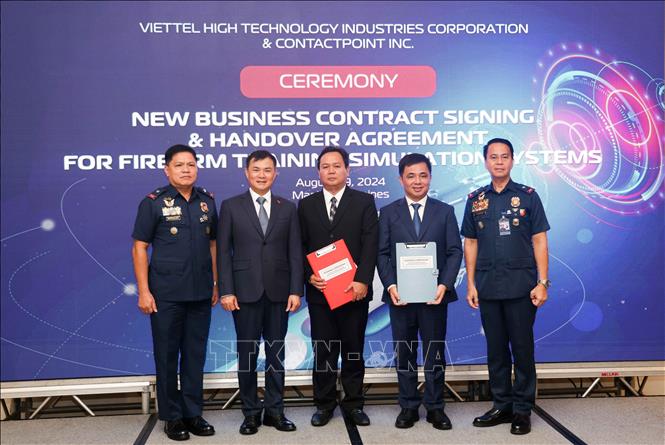 A view of the signing ceremony. VNA Photo: Lê Dương