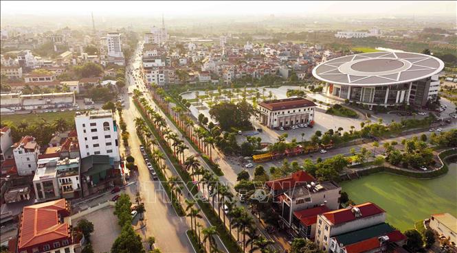 Một góc thị trấn huyện Đông Anh. Ảnh: Vũ Sinh - TTXVN