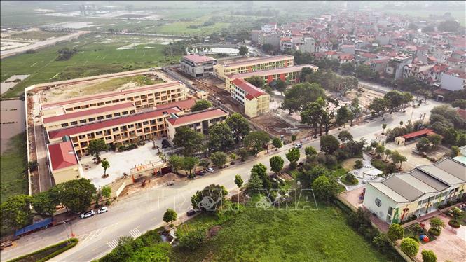 Cụm trường học (Mầm non, Tiểu học, Trung học cơ sở) ở xã Vân Hà được xây dựng theo tiêu chí nông thôn mới. Ảnh: Vũ Sinh - TTXVN