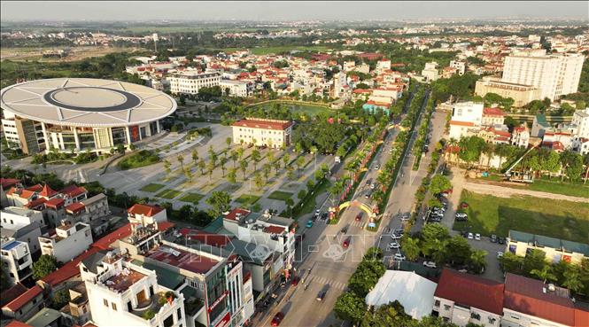 Một góc thị trấn huyện Đông Anh. Ảnh: Vũ Sinh - TTXVN