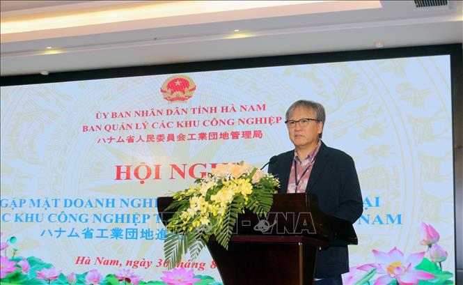 Ryoichi Nakagawa, advisor to Japan Desk Ha Nam, speaks at the meeting. VNA Photo: Nguyễn Chinh