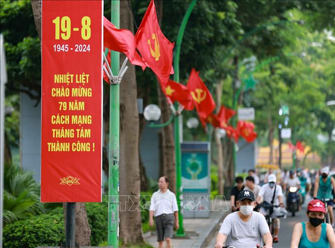 Posters and banners celebrating the 79th anniversary of the August Revolution and National Day are hung around the city. VNA Photo: Thanh Tùng