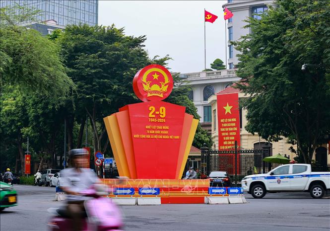Posters and banners celebrating the 79th anniversary of the August Revolution and National Day are hung around the city. VNA Photo: Thanh Tùng
