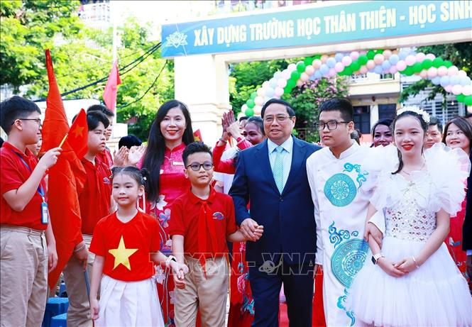 Thủ tướng Phạm Minh Chính đến dự Lễ khai giảng năm học 2024-2025 tại Trường Phổ thông cơ sở Nguyễn Đình Chiểu Hà Nội. Ảnh: Dương Giang-TTXVN