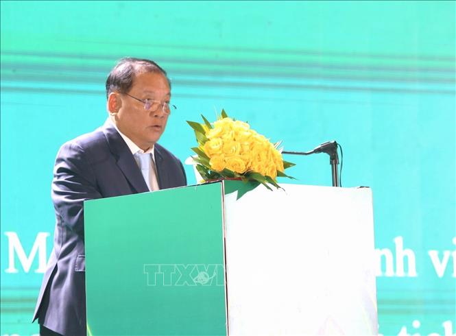 Ông Sum Sannisith, Phó Thống đốc Ngân hàng quốc gia Campuchia phát biểu tại sự kiện. Ảnh: Hoàng Minh - PV TTXVN tại Campuchia