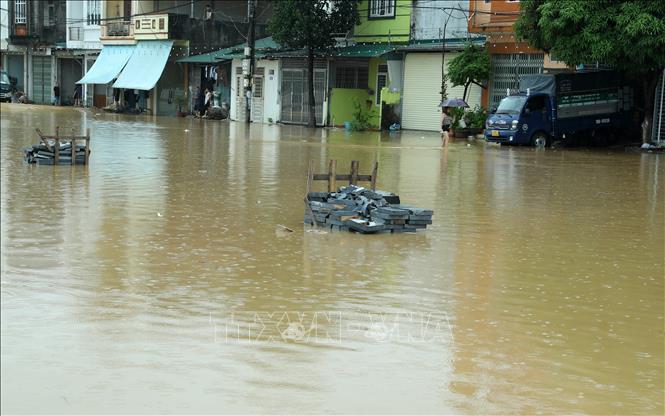 Phường Lào Cai, thành phố Lào Cai chìm trong nước lũ lúc 11g ngày 9/9. Ảnh: Quốc Khánh - TTXVN