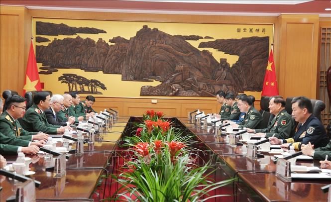 Minister of National Defence General Phan Van Giang meets with Vice Chairman of the Central Military Commission of China Zhang Youxia. VNA/Photo by courtesy