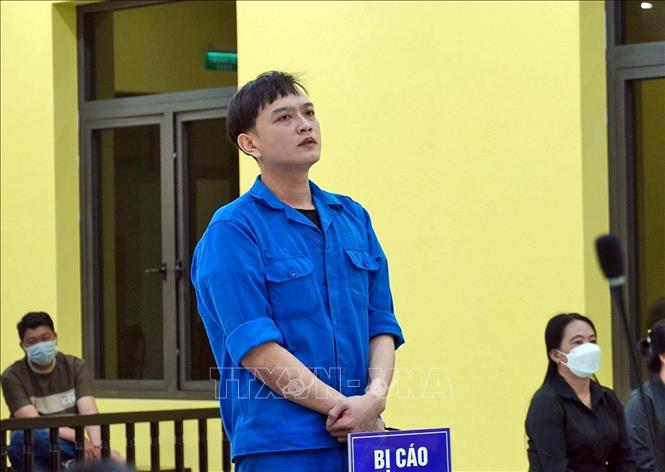 Đối tượng Bùi Vũ Khoa tại phiên toà. Ảnh: Huỳnh Anh - TTXVN