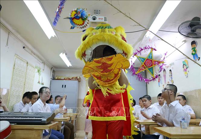 Là cơ sở giáo dục công lập trực thuộc Sở GD&ĐT Hà Nội, trường Tiểu học Bình Minh đón nhận học sinh khuyết tật trí tuệ học hòa nhập và dạy học sinh tiểu học. Ảnh: Thanh Tùng - TTXVN