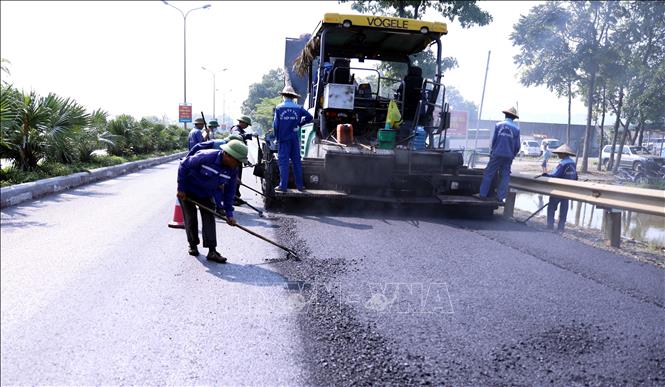 Các dự án đường giao thông nhanh chóng được thi công cho kịp tiến độ. Ảnh: Quang Cường – TTXVN