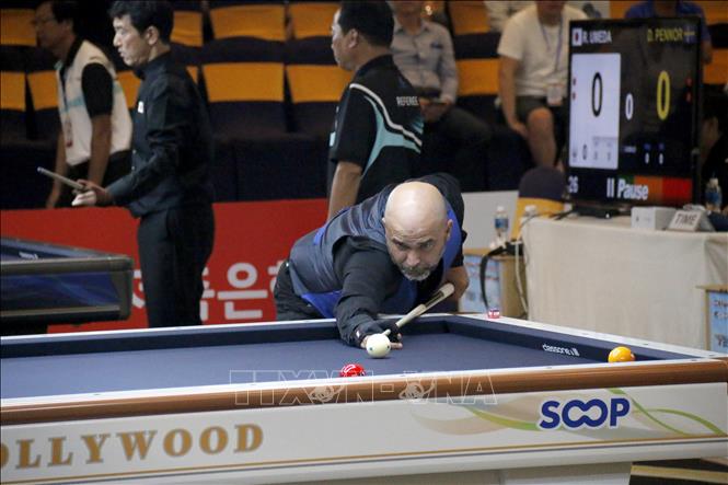 Các cơ thủ thi đấu tại Giải Billiards carom 3 băng vô địch cá nhân thế giới lần thứ 76. Ảnh: Nguyễn Thanh - TTXVN