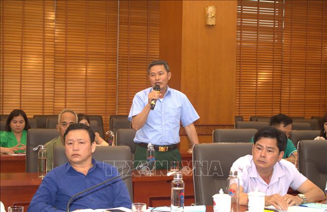 Nông dân Hoàng Văn Chinh, xóm Nam Phong 2, xã Hưng Đạo, TP Cao Bằng, tỉnh Cao Bằng phát biểu tại hội thảo. Ảnh: Chu Hiệu-TTXVN.