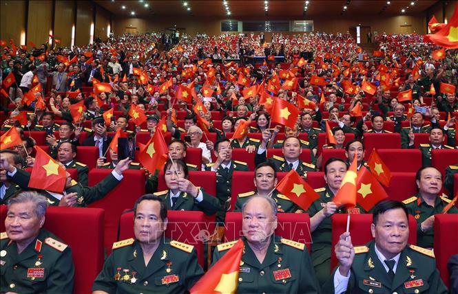 Các đại biểu dự Lễ kỷ niệm 70 năm Ngày Giải phóng Thủ đô. Ảnh: Văn Điệp - TTXVN