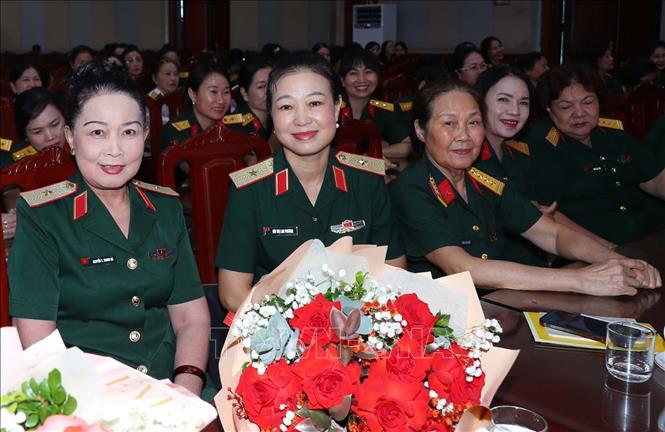 Các nữ đại biểu xuất sắc tham dự buổi gặp mặt. Ảnh: Trọng Đức - TTXVN
