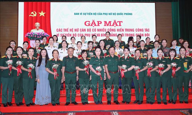 Lãnh đạo Bộ Quốc phòng và các đại biểu tại buổi gặp mặt. Ảnh: Trọng Đức - TTXVN