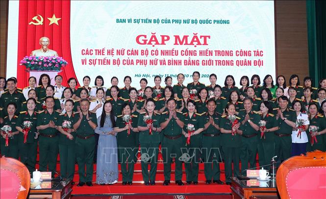 Lãnh đạo Bộ Quốc phòng và các đại biểu tại buổi gặp mặt. Ảnh: Trọng Đức - TTXVN