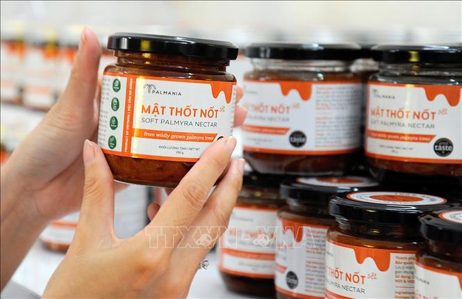 Sản phẩm đường thốt nốt dạng sệt Palmania đã trở thành thương hiệu quen thuộc của người tiêu dùng tại 20 tỉnh, thành phố, với hơn 60 điểm bán hàng trên cả nước. Ảnh: Công Mạo-TTXVN