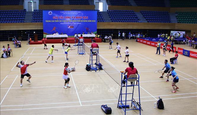 Các vận động viên tranh tài nội dung cầu lông. Ảnh: Trần Lê Lâm - TTXVN 