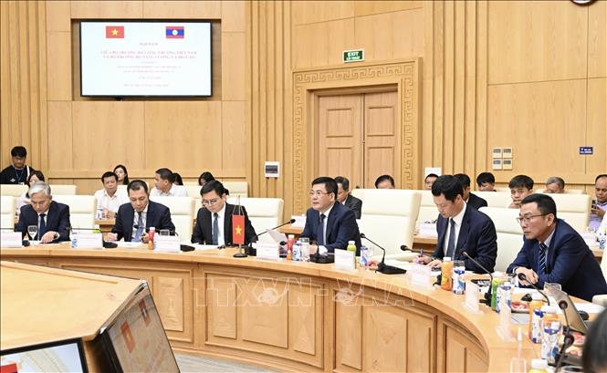 Đoàn Việt Nam tham dự hội đàm. Ảnh: Trần Việt - TTXVN 