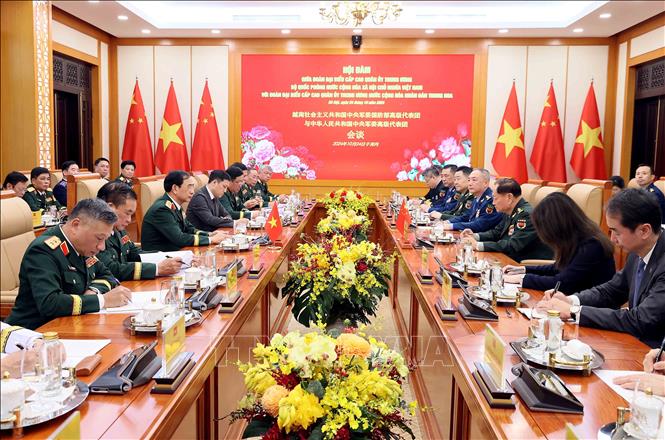 Đại tướng Phan Văn Giang hội đàm với Thượng tướng Trương Hựu Hiệp. Ảnh: An Đăng - TTXVN