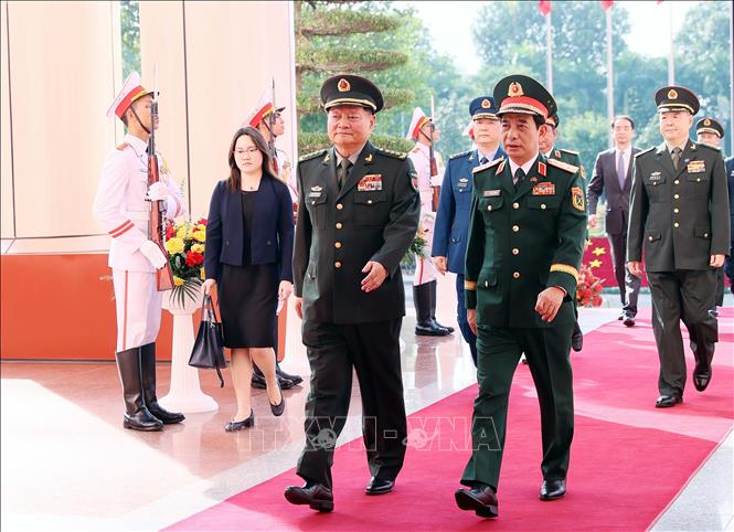 Đại tướng Phan Văn Giang và Thượng tướng Trương Hựu Hiệp. Ảnh: An Đăng - TTXVN